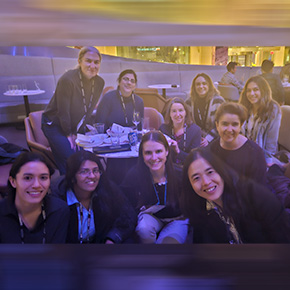 a group of people sit at a table